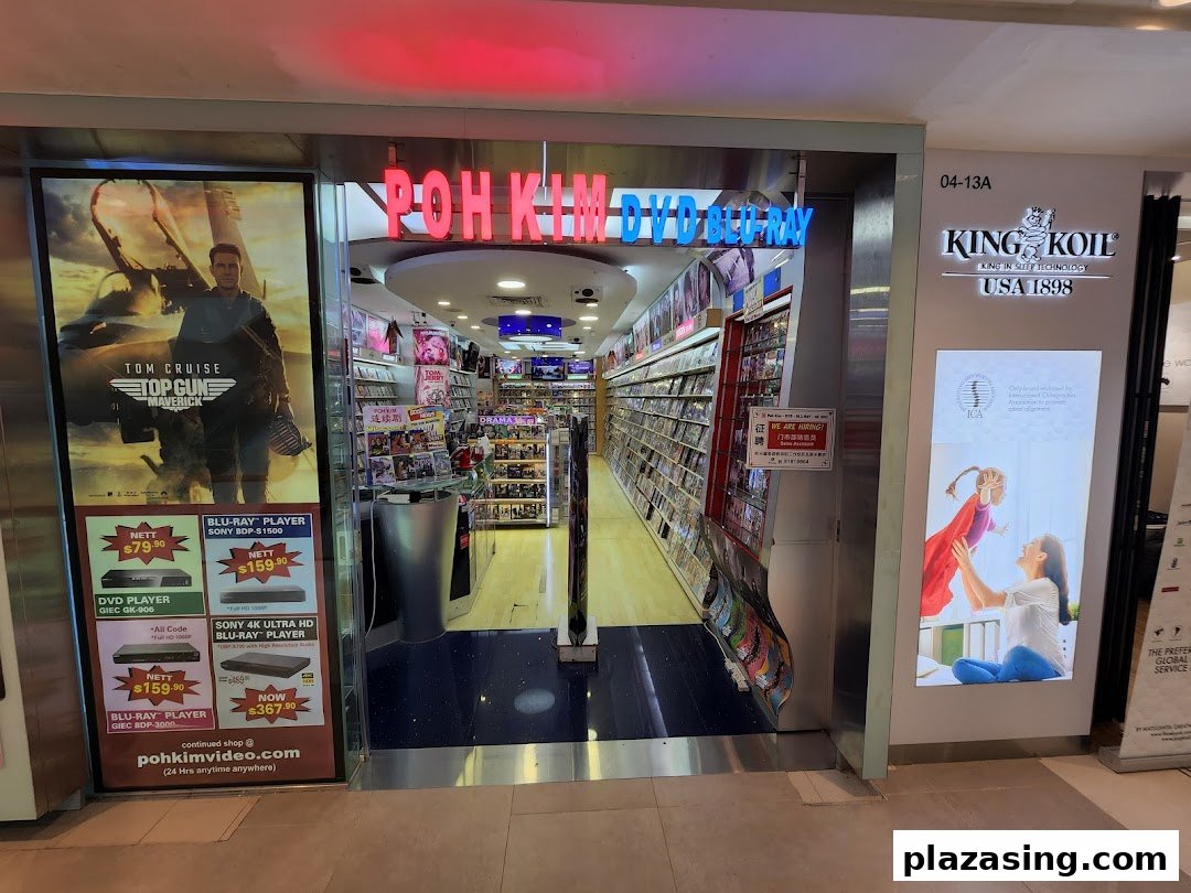 The storefront of Poh Kim DVD Blu-ray, showcasing a wide selection of movies and home entertainment systems.
