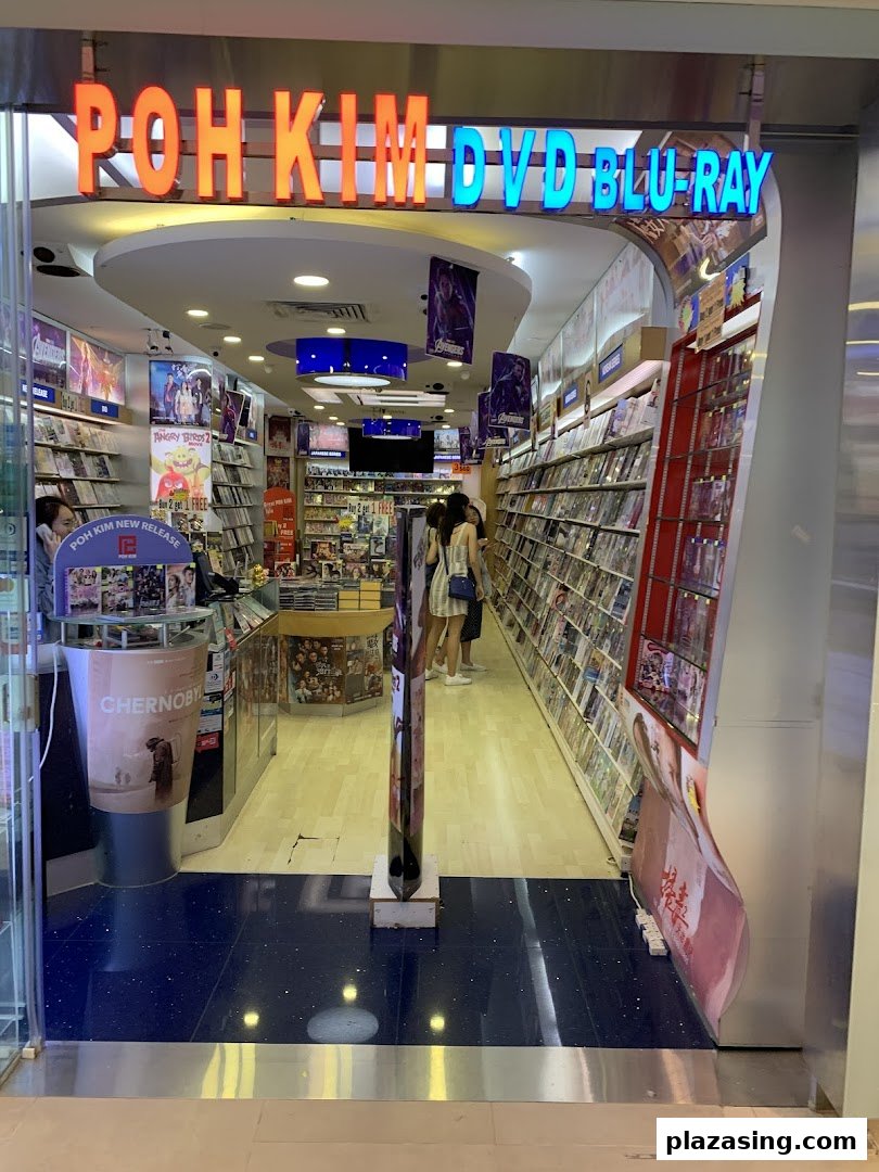 The entrance of Poh Kim, a DVD and Blu-ray store, with shelves of media visible inside.