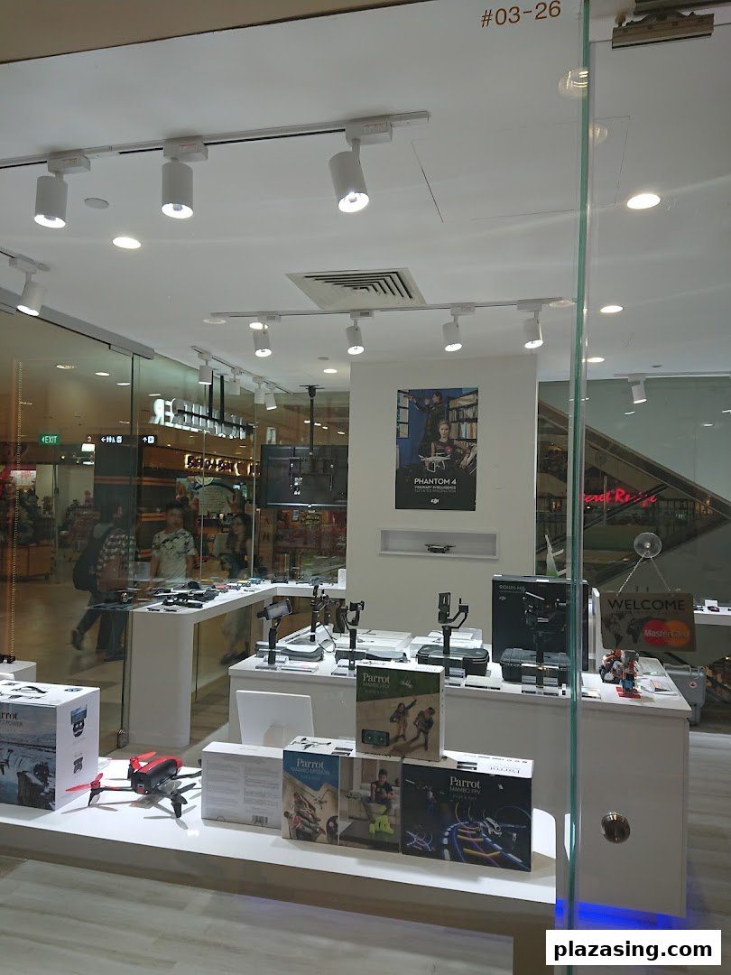 The shop front of Propeller Singapore showcasing drones, camera stabilizers, and tech gadgets on display.