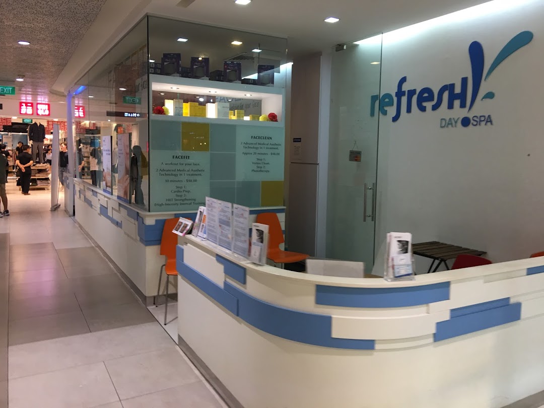 The inviting shop front of Refresh TCM Wellness, showcasing its reception area and service offerings.