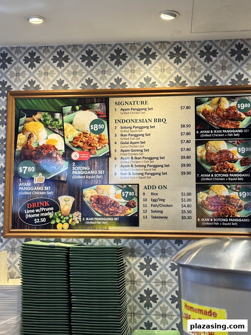 A vibrant menu board displaying various Indonesian BBQ sets, drinks, and add-ons with prices.