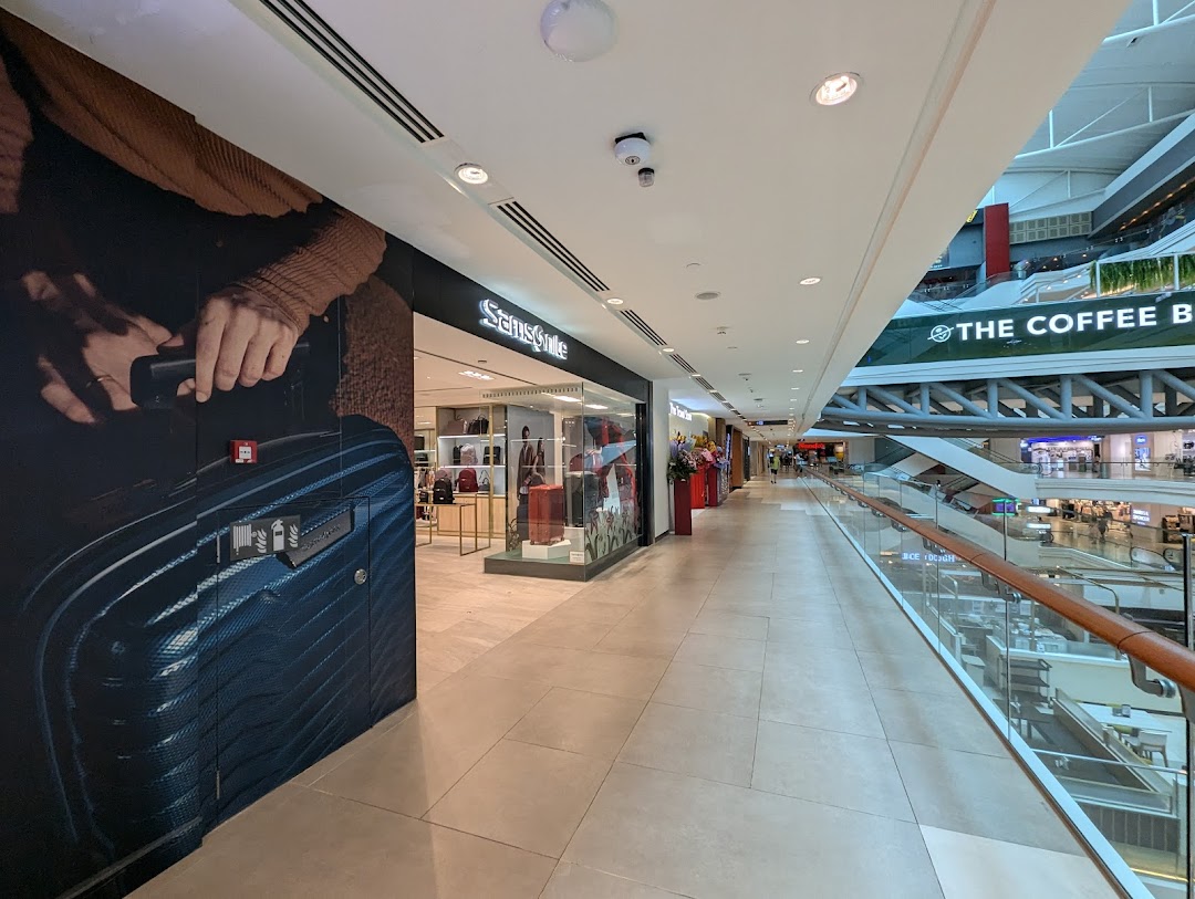 The Samsonite shop entrance at Plaza Singapura, showcasing luggage and travel accessories.