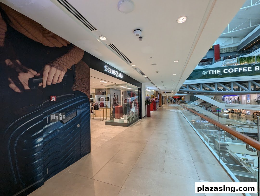 The Samsonite shop entrance at Plaza Singapura, showcasing luggage and travel accessories.