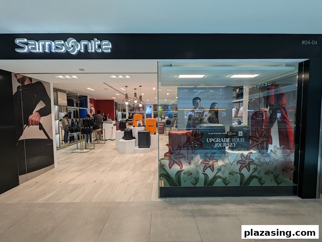 The Samsonite store entrance at Plaza Singapura, showcasing a variety of luggage and travel accessories.