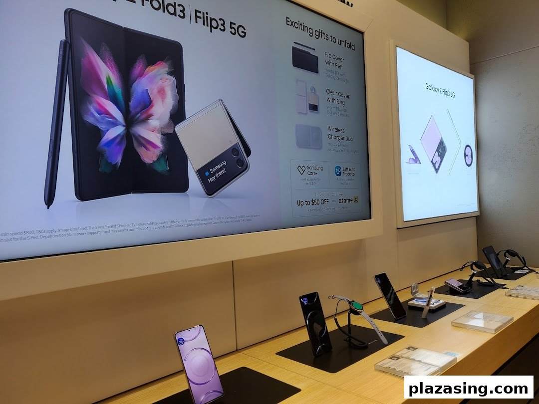An interior view of a Samsung Service Centre showcasing Galaxy Z Fold3, Flip3 5G, and various accessories on display.