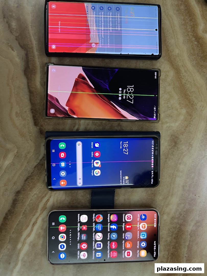 Four Samsung smartphones exhibiting various screen damage and display issues.