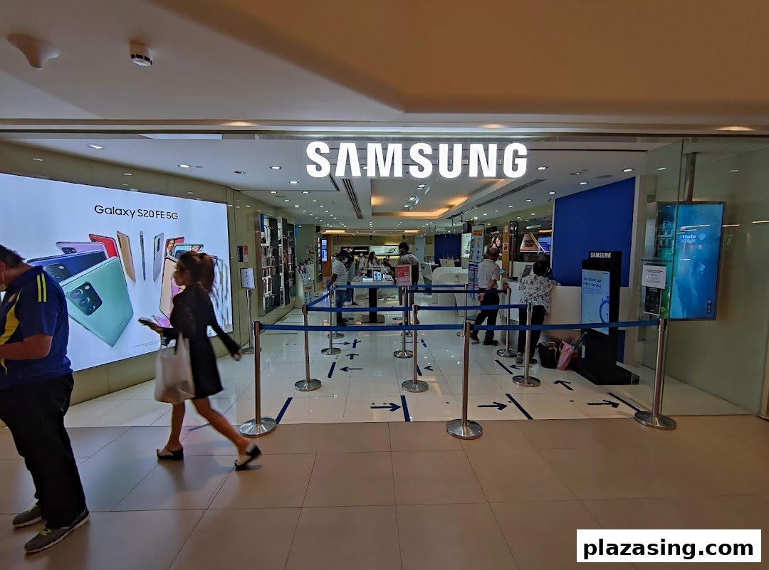 The entrance of a Samsung Service Centre, showcasing products and customer service areas.