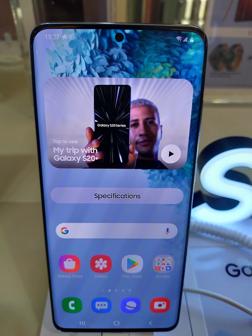 Close-up of a Samsung Galaxy S20+ display showcasing its interface and apps.
