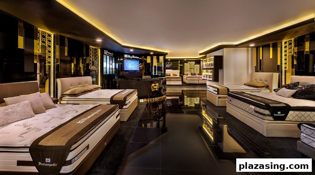 An elegant interior view of Sealy Sleep Boutique showcasing various mattresses and beds in a well-lit showroom.