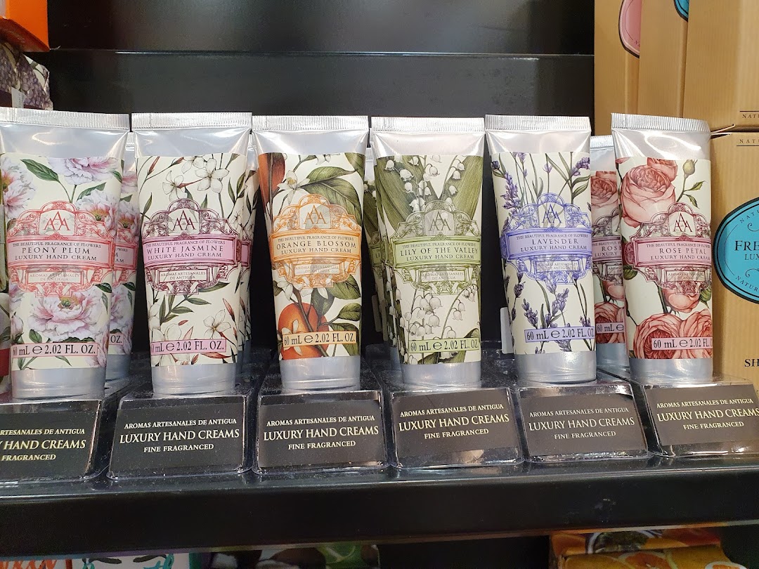 A display of various scented luxury hand creams from Aromas Artesanales de Antigua.