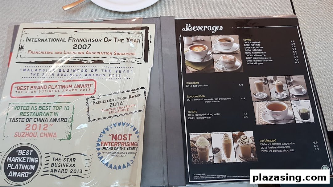 An open menu displaying Secret Recipe's beverage options and a page highlighting their numerous awards.