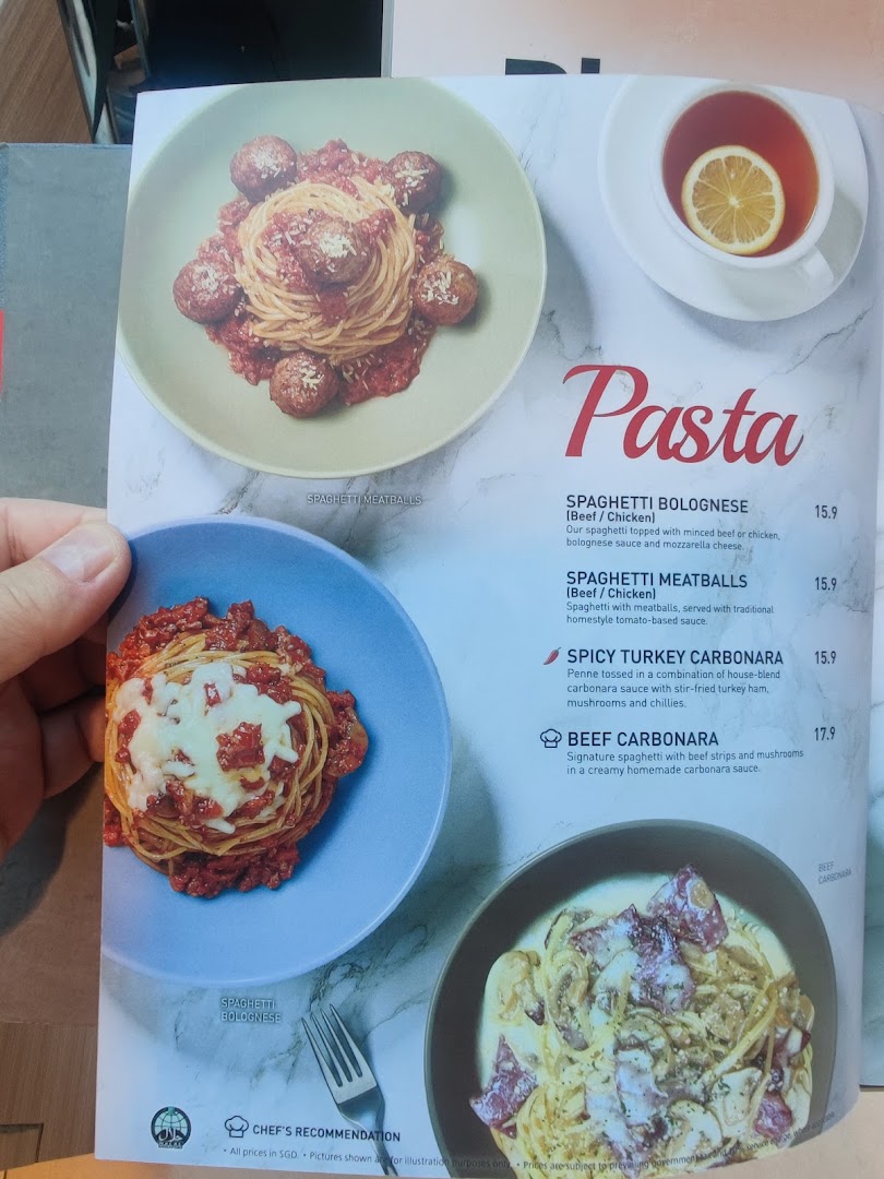 A page from Secret Recipe's menu featuring various pasta dishes with prices and descriptions.
