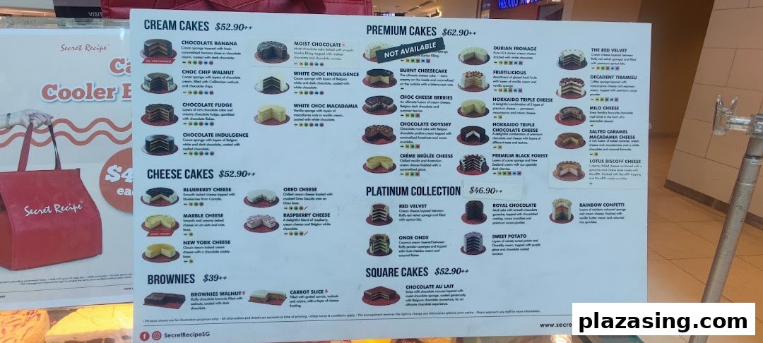 A detailed menu board showcasing various cakes, brownies, and their prices from Secret Recipe.