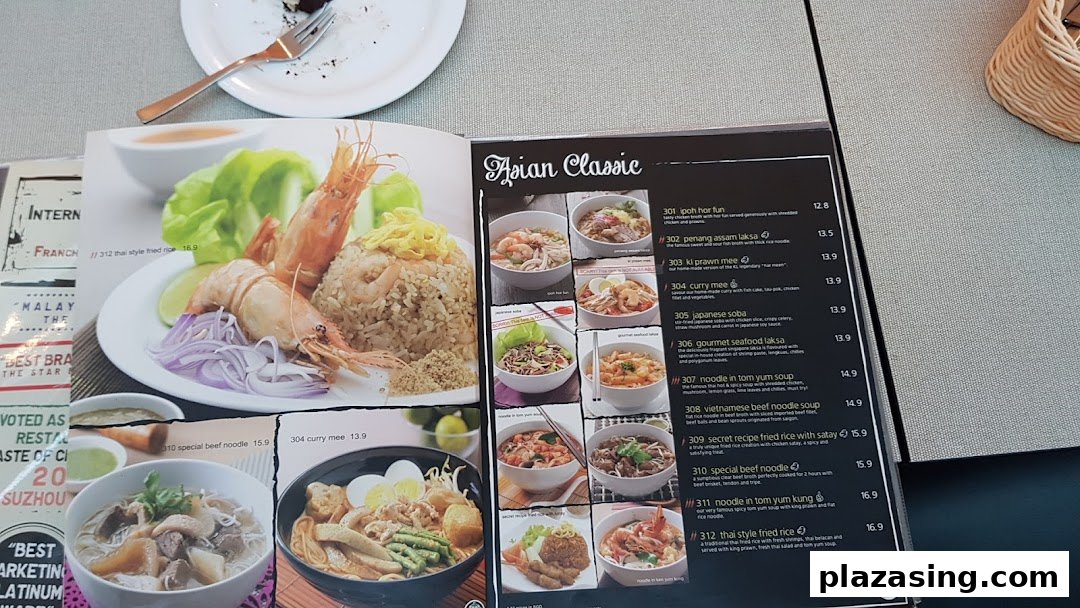 A close-up view of Secret Recipe's 'Asian Classic' menu page featuring various noodle and rice dishes.