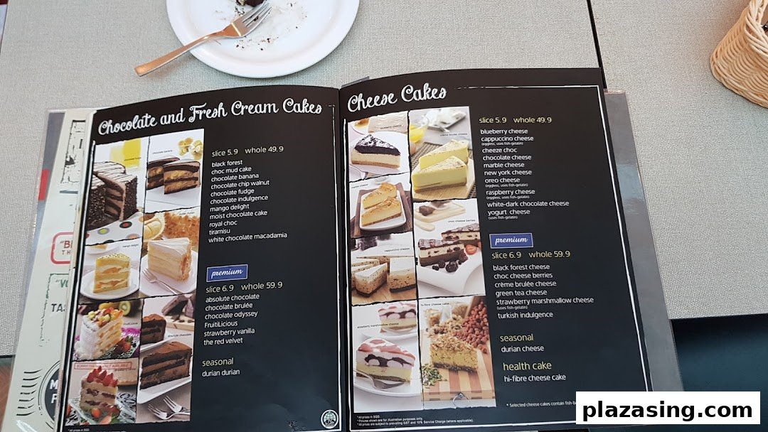 A Secret Recipe menu displaying various chocolate, fresh cream, and cheese cakes with prices.