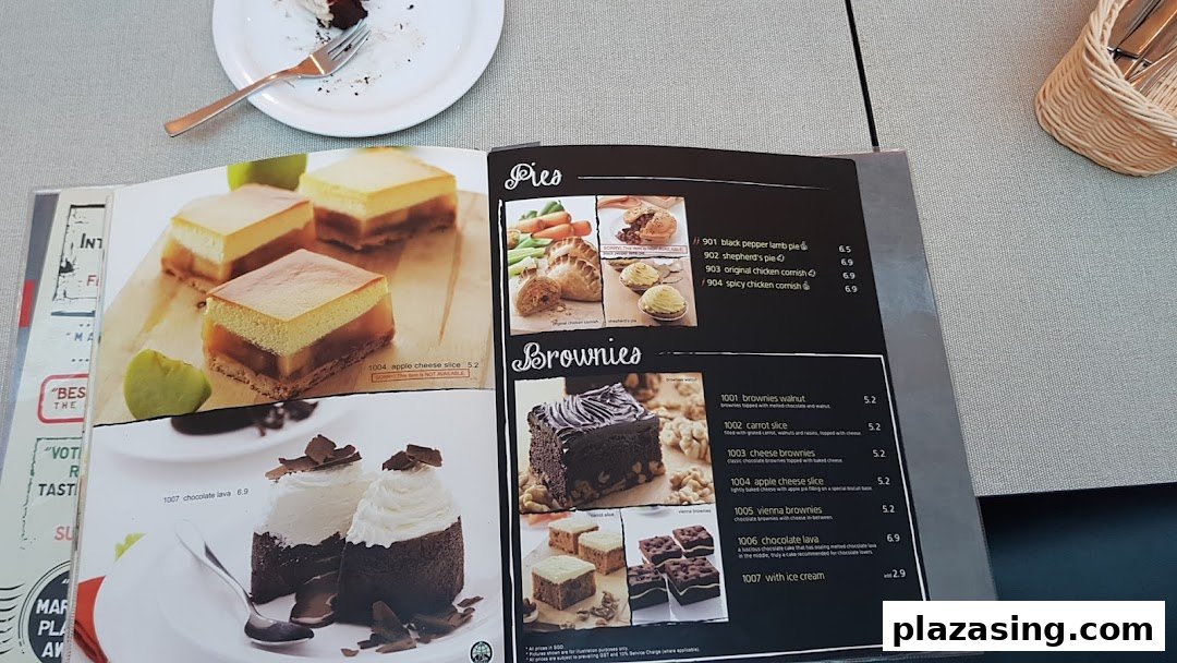 An open menu from Secret Recipe displaying various pies, brownies, and cakes with prices and descriptions.
