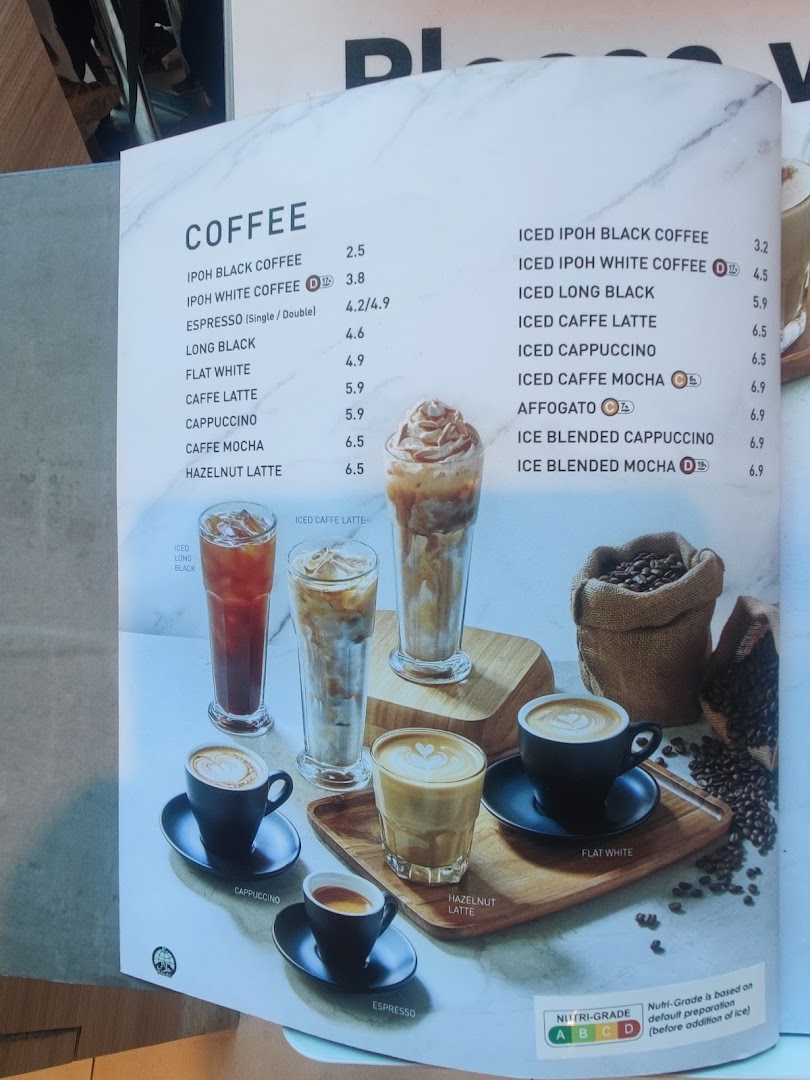 A detailed menu displaying various hot and iced coffee beverages with prices and Nutri-Grade information.