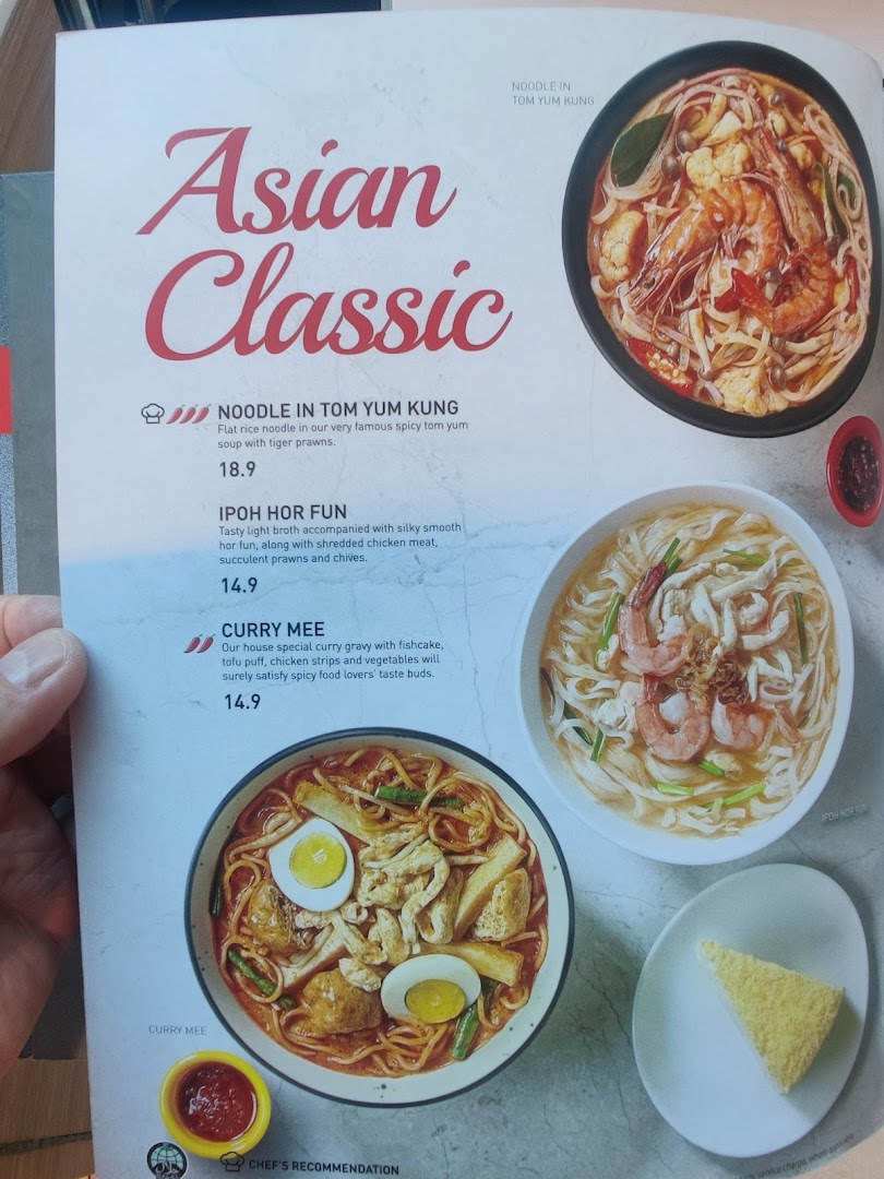 A page from Secret Recipe's menu showcasing classic Asian noodle dishes with descriptions and prices.