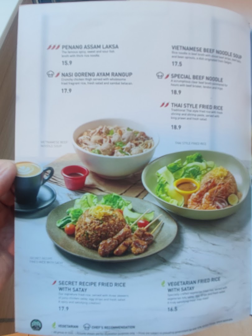 A detailed menu page from Secret Recipe, showcasing various Asian dishes with descriptions and prices.