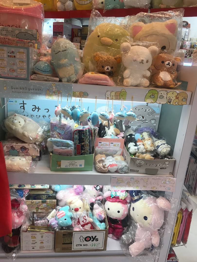 Shelves filled with adorable Japanese character plush toys and merchandise, including Sumikko Gurashi and San-X items.