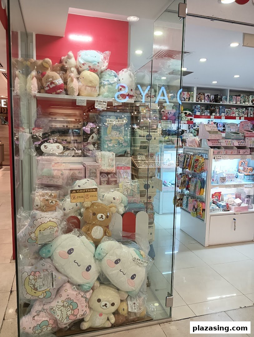 A vibrant shop window display at Seimon-Cho, showcasing a variety of adorable plush toys and character merchandise.