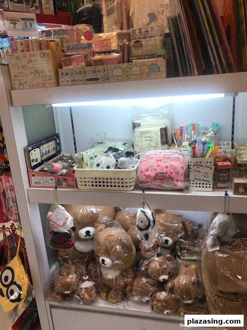 Shelves filled with adorable plush toys, stationery, and character merchandise, showcasing Seimon-Cho's charming product range.