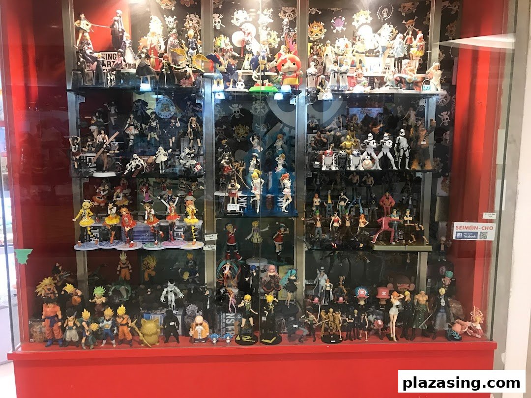 A vibrant display case showcasing a vast collection of anime, manga, and pop culture collectible figures.