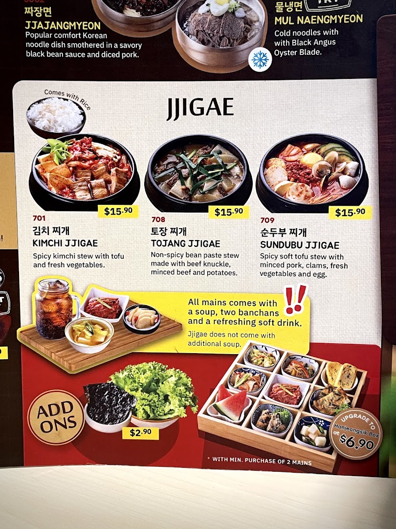 A vibrant menu showcasing Korean jjigae stews, add-ons, and meal set options.