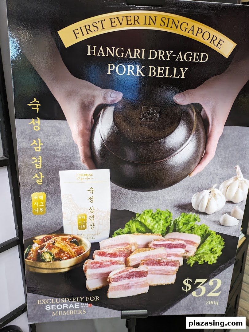A promotional poster showcasing Seorae Jib's exclusive Hangari Dry-Aged Pork Belly with its price.