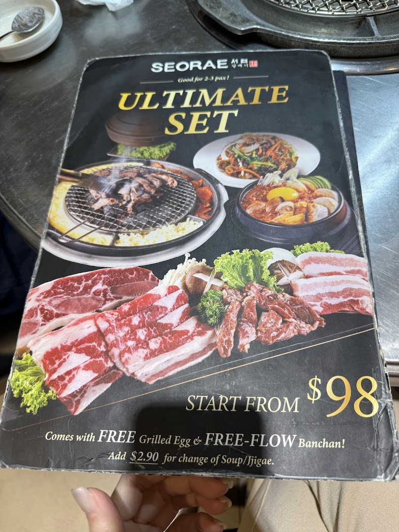 A close-up of Seorae Jib's 'Ultimate Set' menu featuring Korean BBQ meats and side dishes.