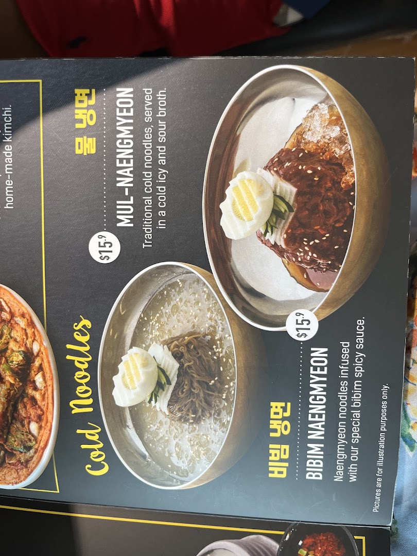 A menu page showcasing two types of Korean cold noodles: Mul-Naengmyeon and Bibim Naengmyeon.