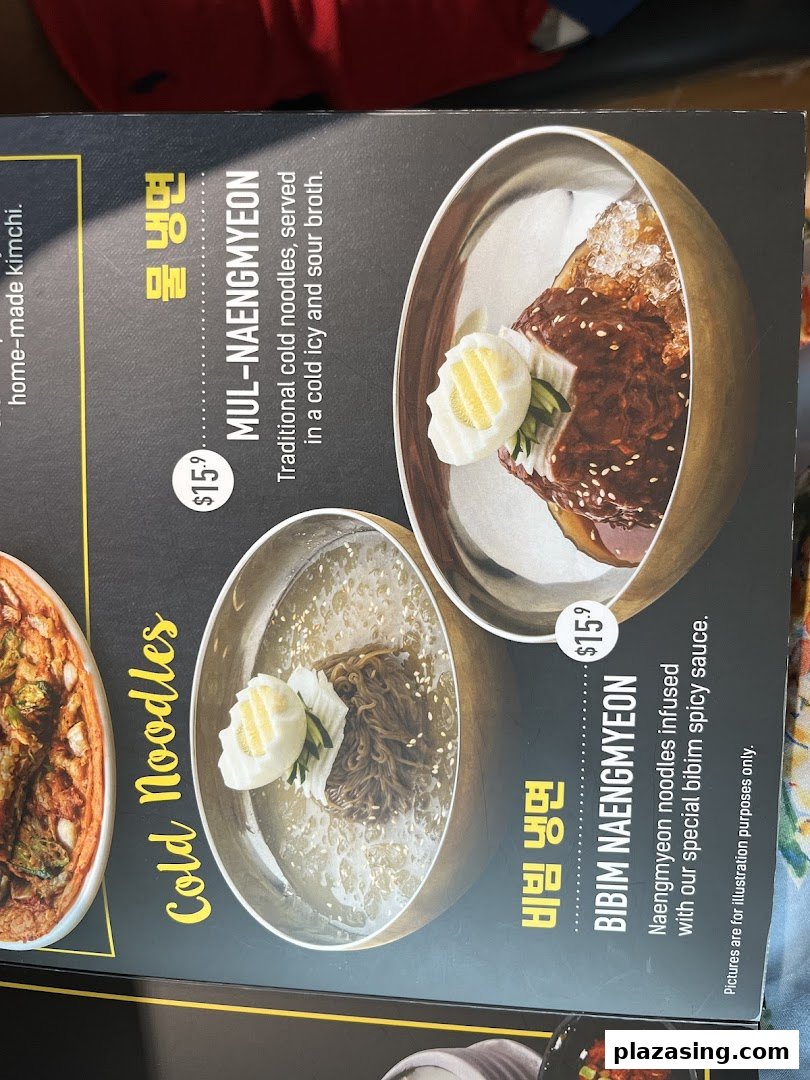 A menu page showcasing two types of Korean cold noodles: Mul-Naengmyeon and Bibim Naengmyeon.