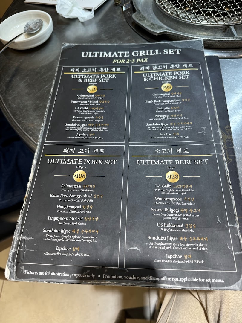 A detailed menu displaying various Korean BBQ grill sets for 2-3 people with prices and descriptions.