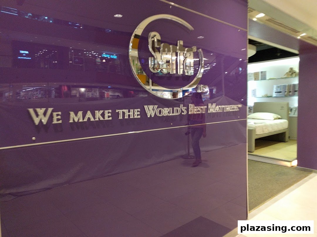The Serta Sleep Center shop front features a prominent logo and the slogan 'We Make The World's Best Mattress'.