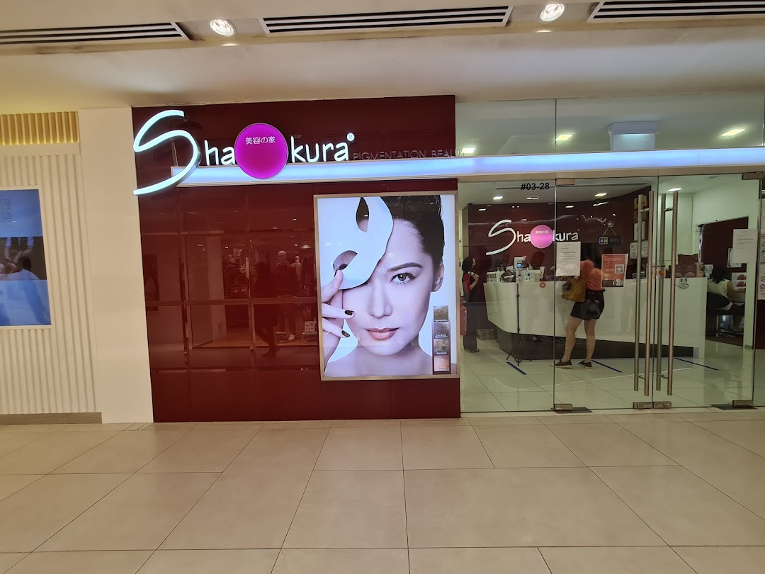 Exterior view of Shakura Pigmentation Beauty shop with a prominent beauty advertisement.