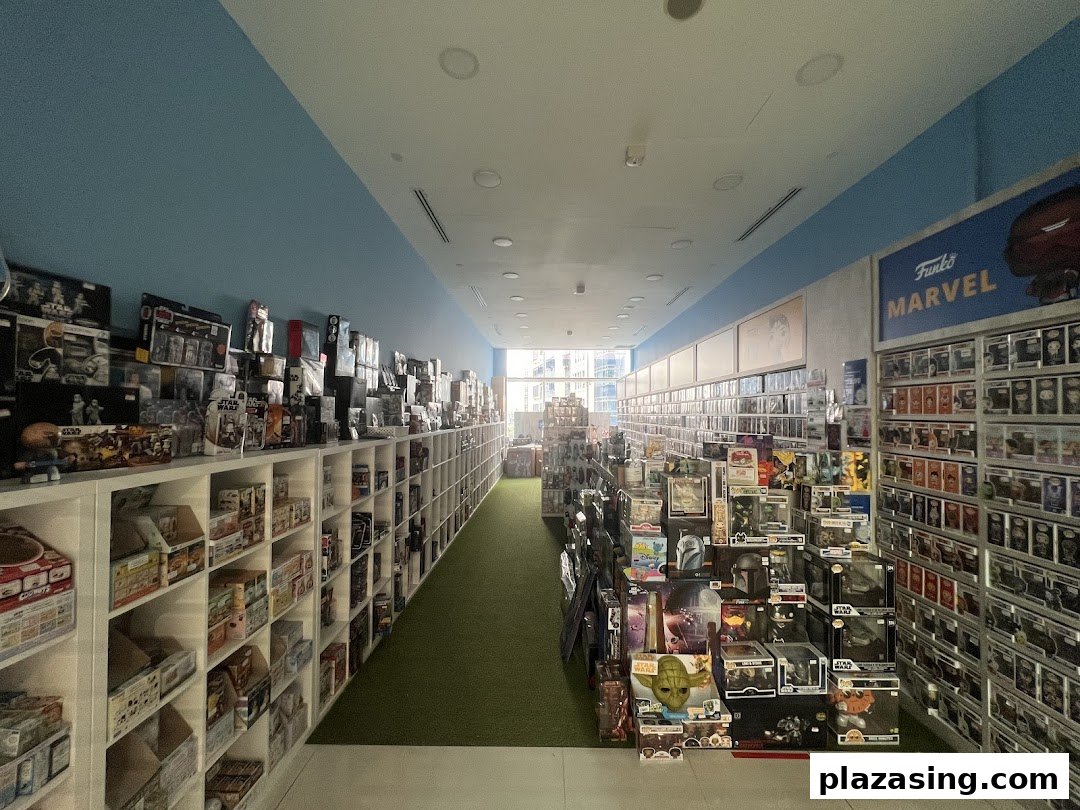 Interior view of Simply Toys, showcasing long aisles filled with diverse toys and collectibles, including Funko Pop figures.