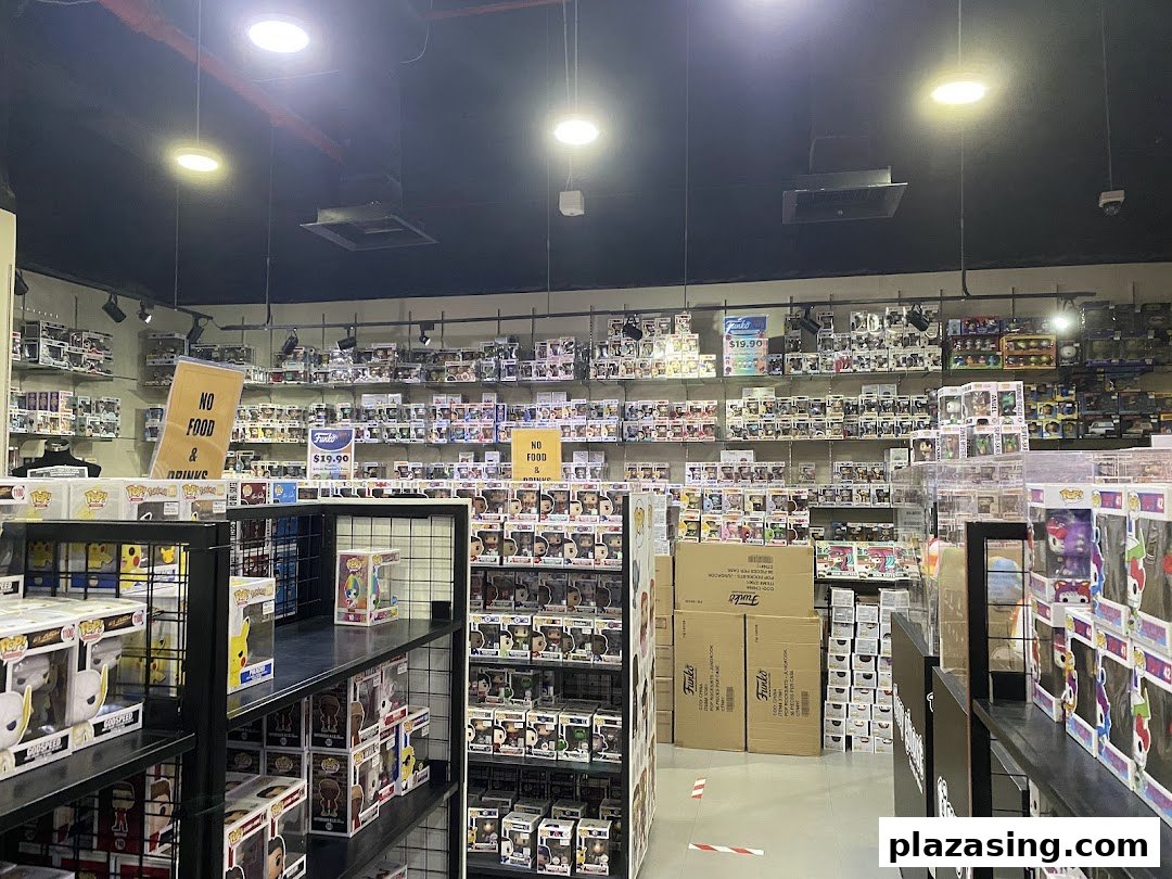 An interior view of Simply Toys, showcasing shelves filled with numerous Funko Pop collectible figures.