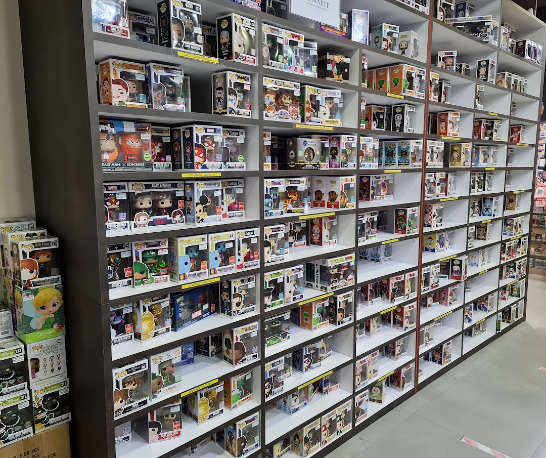 Shelves filled with numerous Funko Pop figures and other collectibles inside Simply Toys.