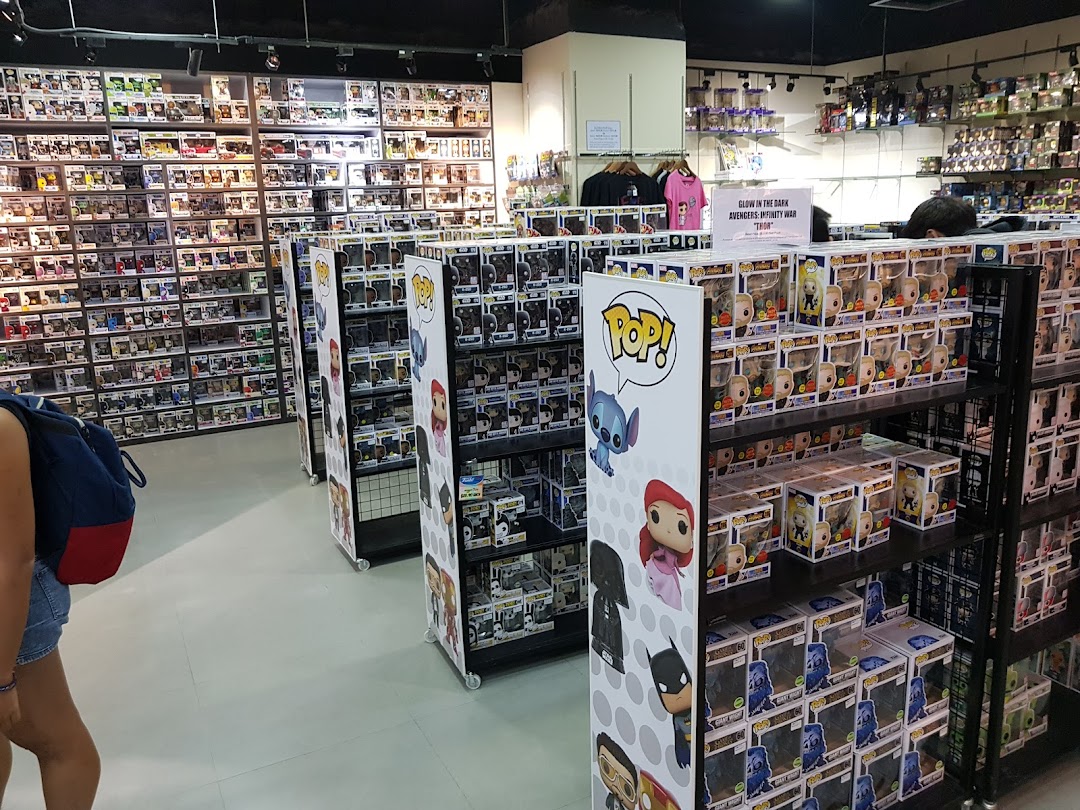 Interior of Simply Toys, showcasing extensive shelves of Funko Pop! figures and collectibles.