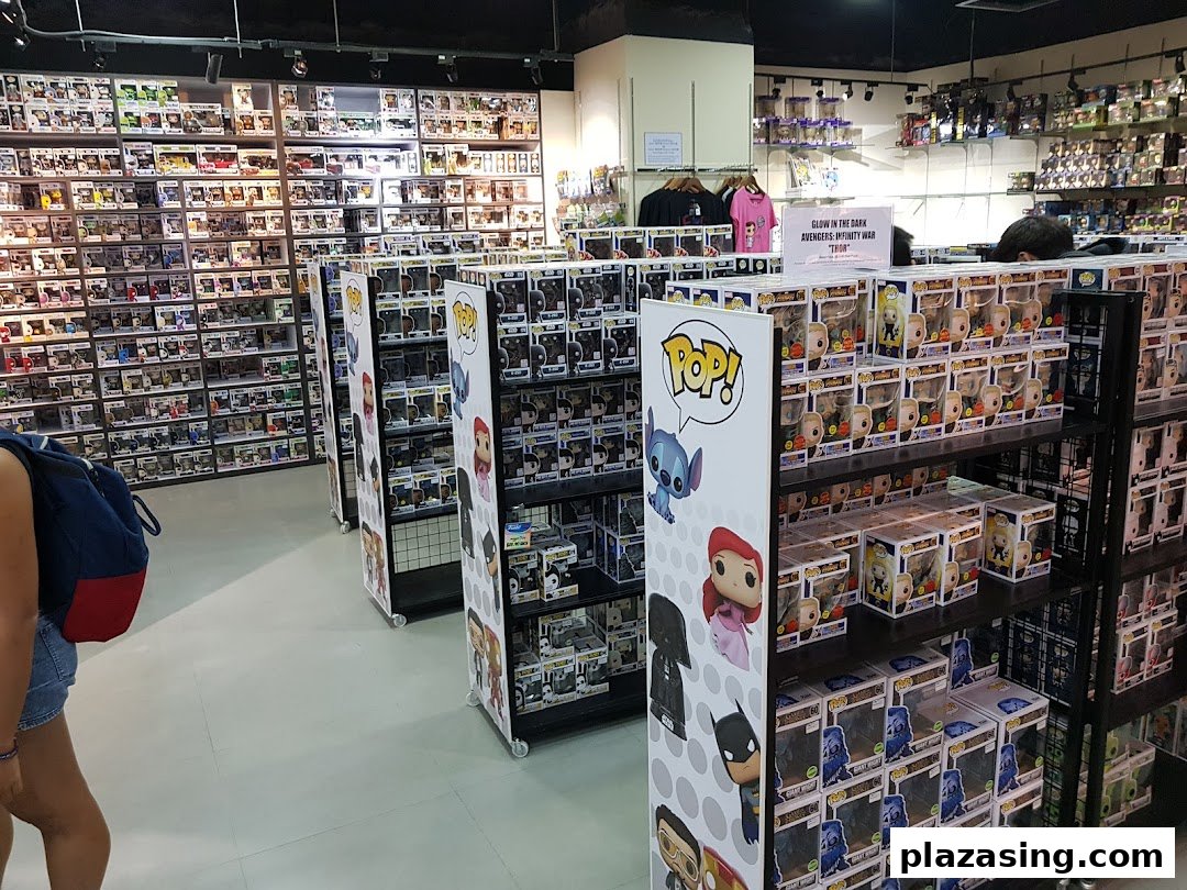 Interior of Simply Toys, showcasing extensive shelves of Funko Pop! figures and collectibles.