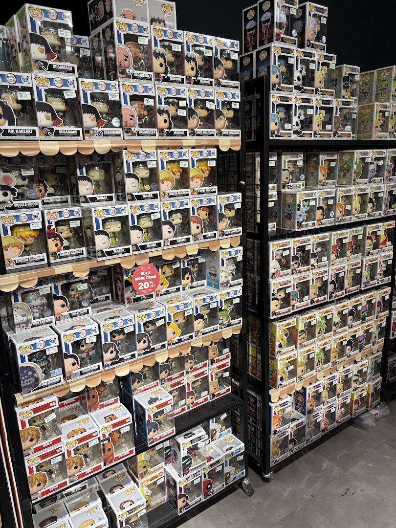 Shelves packed with a wide variety of Funko Pop collectible figures at Simply Toys.