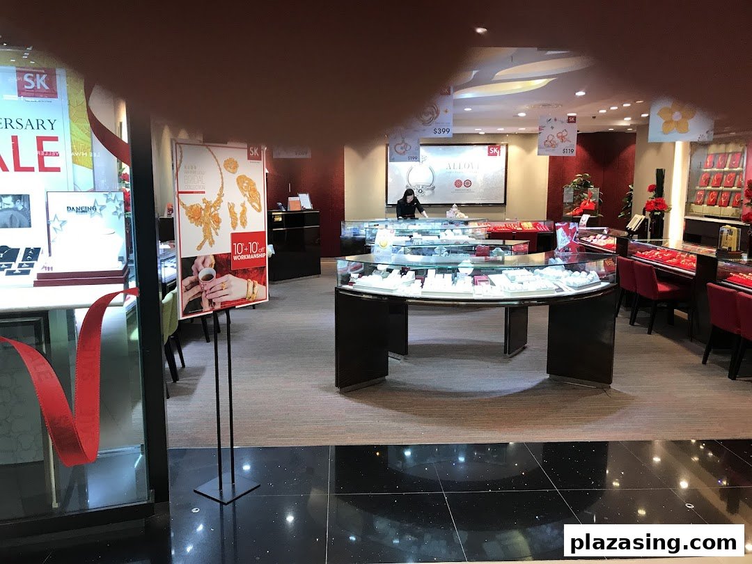 Interior view of SK Jewellery, showcasing various display cases filled with exquisite gold and diamond pieces.