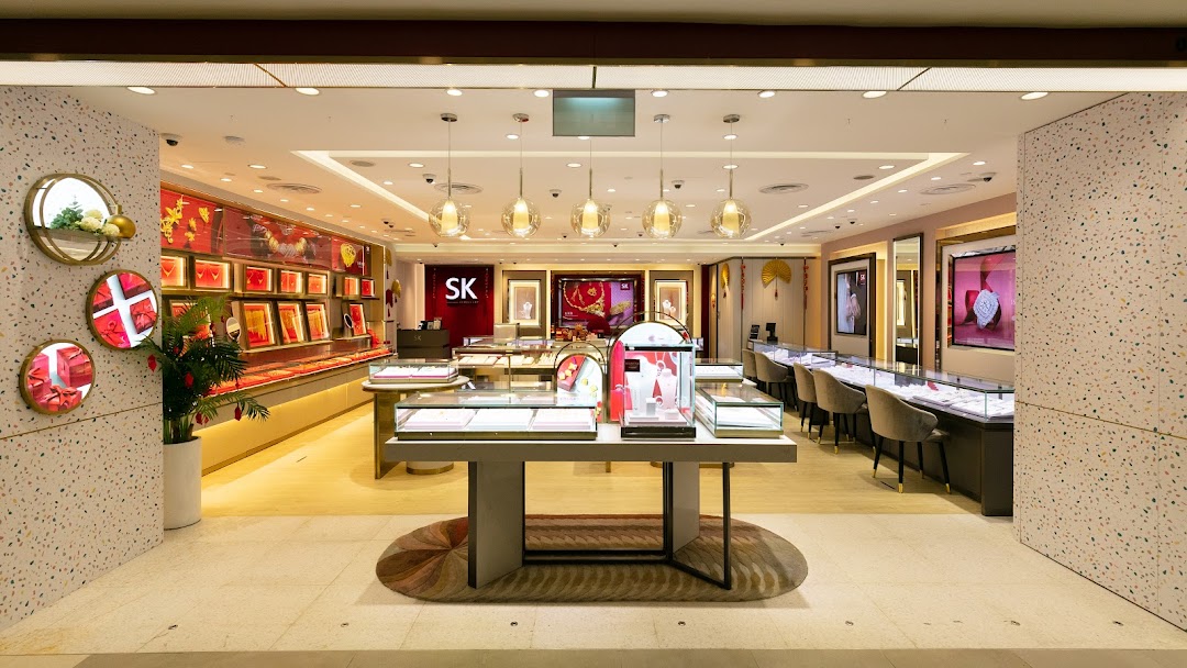 The interior of SK Jewellery, showcasing elegant display cases filled with various jewelry pieces.