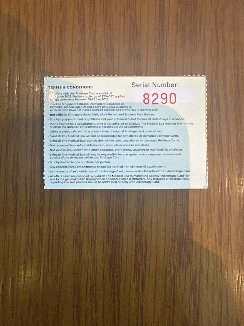 A SkinLab The Medical Spa Privilege Card displaying terms and conditions.