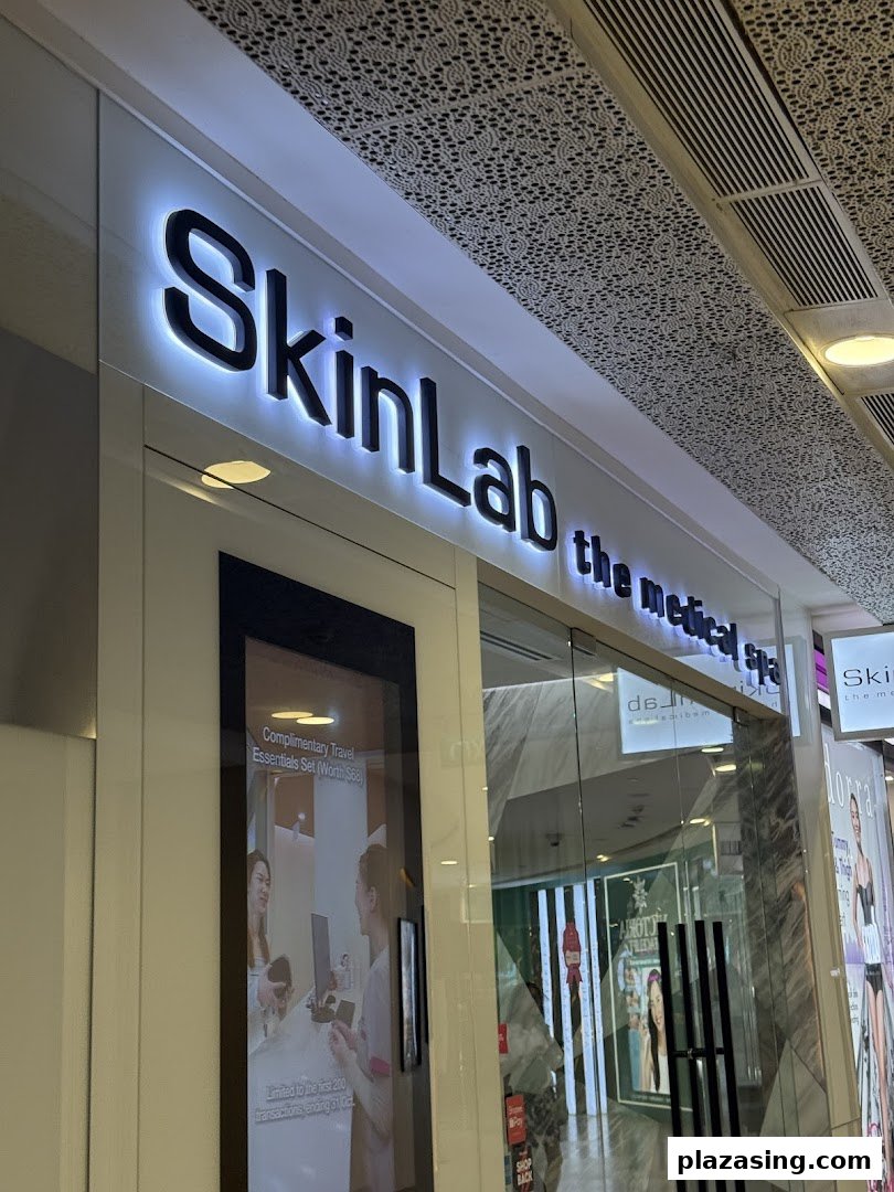 The illuminated storefront of SkinLab The Medical Spa, featuring its prominent signage and entrance.