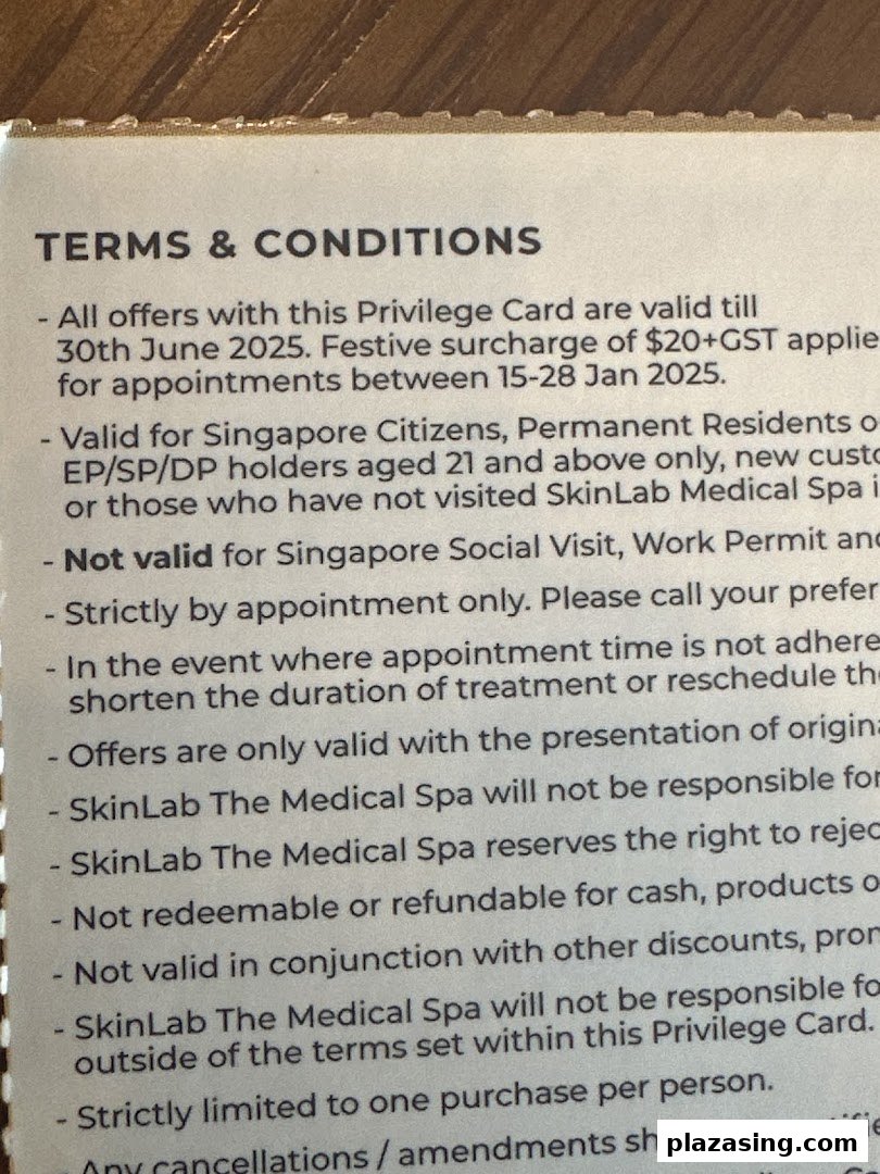 Close-up of SkinLab The Medical Spa's privilege card terms and conditions.