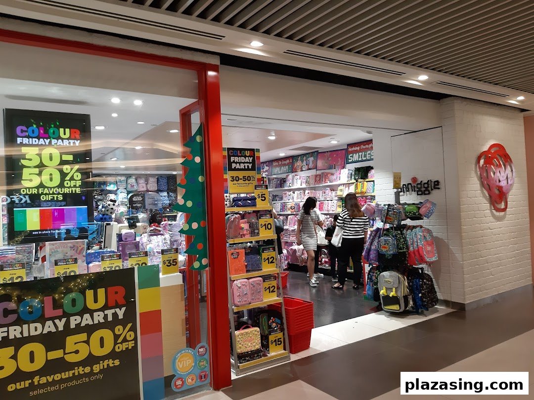 Smiggle shop front with colorful displays, promotional signs, and customers inside.