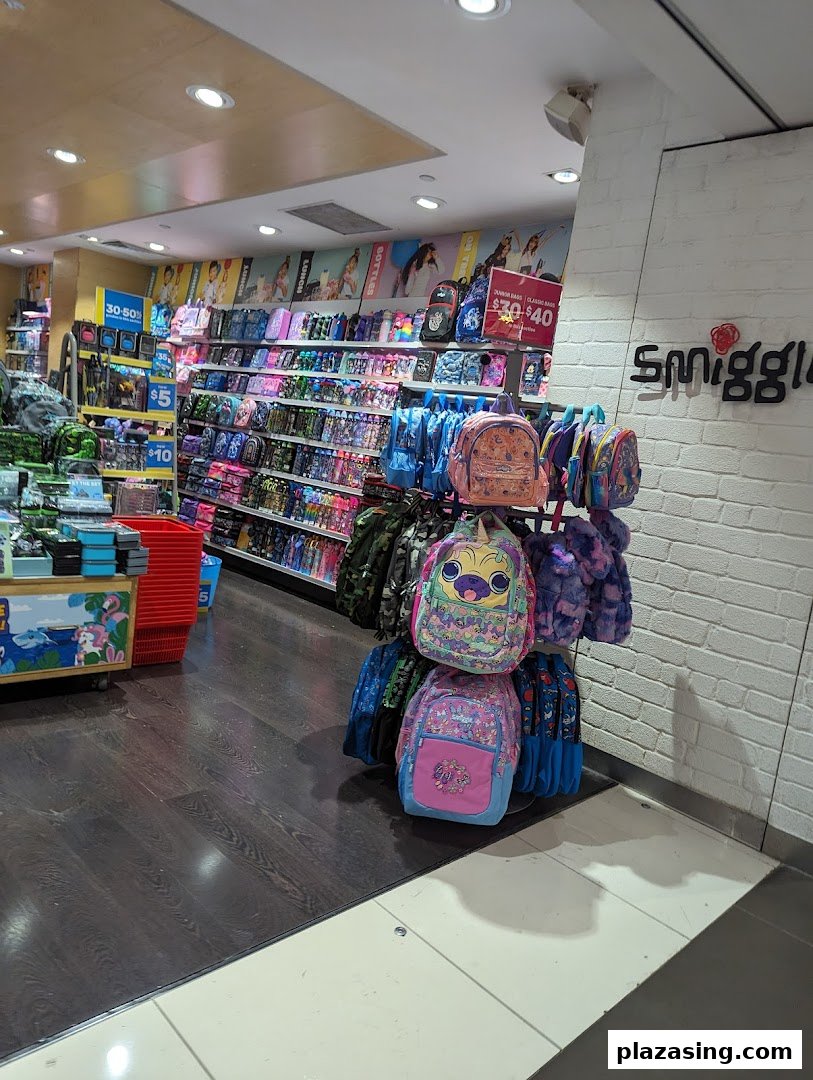 Colorful backpacks and stationery fill the vibrant interior of a Smiggle store.