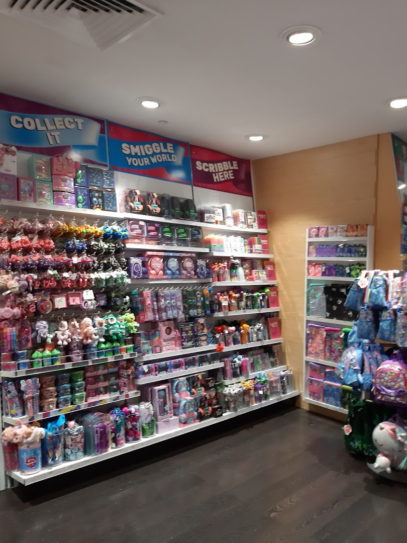 Interior view of Smiggle, showcasing colorful stationery, accessories, and gifts on display shelves.