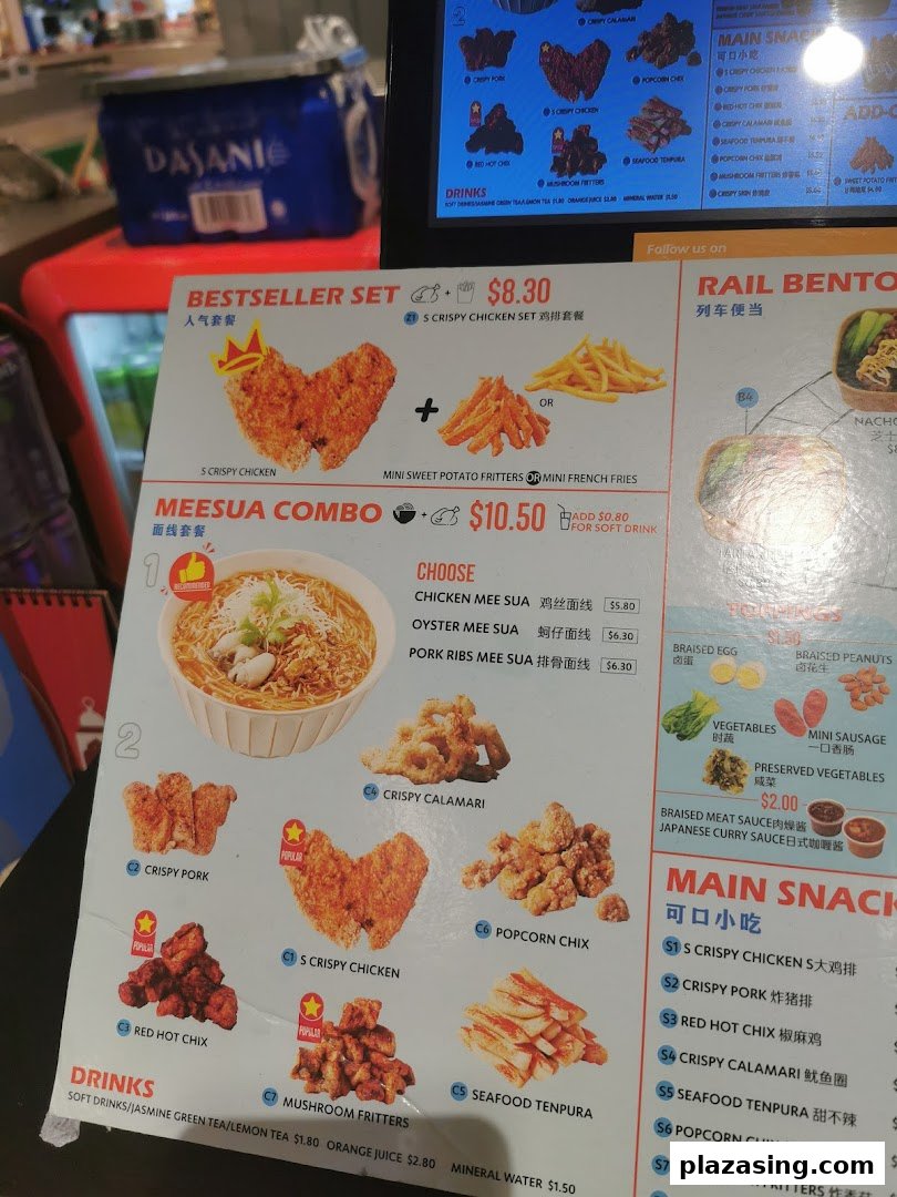 A vibrant menu board displaying various fried snacks, noodle combos, and drinks from Snackz it!.
